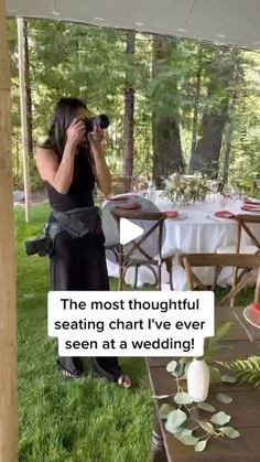 a woman taking a photo with her cell phone in front of a table set for a wedding