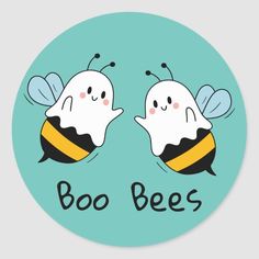 two cartoon bees with the words boobees on their faces, one is white and the other is black