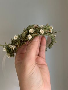 Tieback Halo Flower Crown with greeeny and white Dried florals are mounted on Natural Jute rope covered wire. The crown is backed with felt for extra comfort. Headband is adjustable . Due to the nature of the dried flowers, this crown is very fragile and should be worn and handled with care. Each piece is custom made and no two are 100% alike. If you are not seeing something that you are looking for, please convo me for a custom order. Would be happy to accommodate custom orders if I am able to. Greenery Crown, Wearing Headbands, Dried Flower Crown, Newborn Crown, Crown Halo, Baby Flower Crown, Boho Flower Crown, Floral Halo, Dried Florals