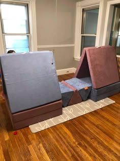 two beds made to look like they are sitting on the floor