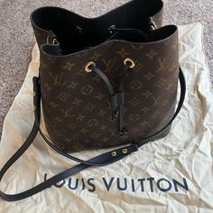 Still In Great Condition Because It Was Never Worn As An Everyday Bag. Many Ppl I See Have Heavy Darkening, Peeling, Cracking Of The Leather Of The Straps And The Strap Wax But This Bag Is In Excellent Condition. Have A Lip Gloss Stain In The Inside But Nothing Major. Dust Bag Included. Bucket Bag With Removable Pouch In Monogram Canvas, Monogram Canvas Pouch Bucket Bag For Daily Use, Monogram Canvas Bucket Bag For Daily Use, Daily Monogram Canvas Pouch Bucket Bag, Daily Use Monogram Canvas Bucket Bag, Daily Monogram Canvas Shoulder Bag With Dust Bag, Bucket Bag Satchel With Removable Pouch In Monogram Canvas, Monogram Canvas Satchel Bucket Bag With Removable Pouch, Monogram Canvas Bucket Bag With Removable Pouch