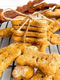 cookies and bacon on a cooling rack with twinkies tied to it's sides