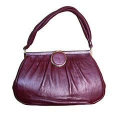 "This gorgeous Vintage 60s-70s Maroon Burgundy Leather Gold Top Handle Handbag Purse. reminds you of one of your grandmother's bags, but in an updated way.  Pair this with jeans, dress, suit the ideas are endless with this one.  It comes with a snap closure, gold tone trim, inside zipper and lined in black. 10\" L 6.5\" W 6\" Inside Depth 5.75\" Strap Drop" Retro Burgundy Shoulder Bag, Retro Burgundy Shoulder Bag For Everyday, Retro Burgundy Shoulder Bag For Daily Use, Retro Burgundy Bags For Daily Use, Retro Burgundy Rectangular Bag, Retro Burgundy Satchel Shoulder Bag, Retro Burgundy Bag For Everyday Use, Retro Leather Shoulder Bag For Party, Retro Burgundy Travel Bag