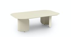 a white table on a white background with no one around it or in front of it