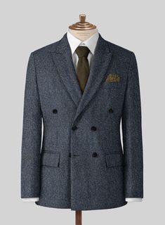 Still stuck for inspiration on how to incorporate tweed into your wardrobe? Look no further and try our Harris Tweed Wide Herringbone Blue suit. Crafted from pure wool, the suit offers comfort and enough warmth to help you fight the chilly climate with ease also the outfit hue will keep you looking stylish for any occasion day or night. For an elegant ensemble pair it with a white shirt, black tie and tan oxford shoes.   Look Includes  Harris Tweed Wide Herringbone Blue Fabric  Double Breasted J Luxury Tweed Jacket With Herringbone Pattern For Business, Timeless Tweed Jacket With Herringbone Pattern For Business, Timeless Business Tweed Jacket With Herringbone Pattern, Herringbone Tweed Jacket For Business, Business Tweed Jacket With Herringbone Pattern, Tailored Timeless Tweed Jacket, Luxury Tailored Tweed Jacket With Herringbone Pattern, Wool Suits With Herringbone Pattern For Business Casual, Formal Winter Suit With Herringbone Pattern