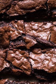 chocolate brownies are stacked on top of each other