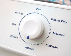 the control panel on an appliance with instructions for how to change it's knob