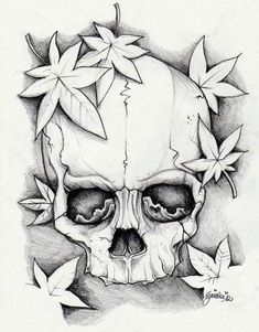 a drawing of a skull with leaves around it