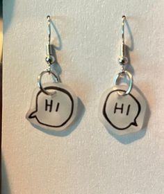 Heartstopper "Hi" earrings made with shrinky dinks. Orders come with several extras! Shrinky Dink Necklace, Heartstopper Earrings, Fun Clear Jewelry As Gift, Fun Clear Jewelry As A Gift, Fun Clear Jewelry For Gifts, Shrinky Dink, Shrinky Dink Ideas, Shrinky Dink Art, Shrinky Dink Earrings