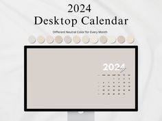 a desktop computer monitor with a calendar on the screen, and text that reads desktop calendar