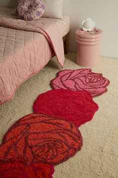 Grow your own rose garden in your space with this oh-so cozy tufted area rug. Made from a plush cotton-polyester blend, this shaggy rug features a rose silhouette that lends whimsical, romantic charm to your space. Available exclusively at Urban Outfitters. Features Rose Tufted Shag Rug from UO Home Tufted area rug in a rose silhouette for a charming finish Plush tufted rug made from a soft cotton-polyester blend UO exclusive Content + Care 83% Cotton, 17% polyester Spot clean Imported | Rose Sh Strawberry Rug, Throw Rugs Bedroom, Rose Silhouette, Entryway Rugs, Paradise Falls, Wood Room Divider, Furniture Apartment, Velvet Lounge Chair, Whimsical Romantic