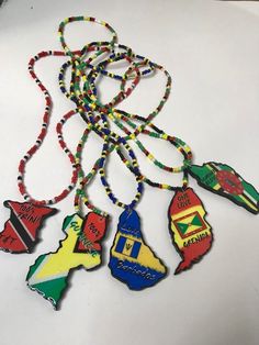 Handmade Caribbean country necklace with beaded chain. Pendant measures about 1.5- 2 inches wide Caribbean Jewelry, Country Necklace, Beaded Necklaces, Chain Pendant, Barbados, Trinidad, Beaded Chain, Trinidad And Tobago, Jewelry Inspiration