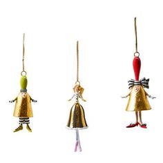 three christmas ornaments hanging from strings on a white background, each decorated with a gold dress and bow