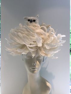 Bird fascinator- Snowy Owl -Feather Headband- White Coque feather headband -Derby -Owl Fascinator- Owl Headband- bird costume- Halloween. Hello,        This fascinator is perfect for a wedding, a holiday party, Burning Man, Derby or Halloween.It's a snowy white owl and will be the hit of any occasion!          This white coque feather fascinator has an owl bird perched in his feather nest. It styrofoam covered with feathers.   I call him Oscar. He's looking for a home!     It is about 8- 10 inches round and his is about 12 inches high. It is placed on a 1/4" white or black grosgrain headband covered stainless steel headband that is adjustable to fit any size head. -------------------------------------------------  I ship US Postal Service.      USA DOMESTIC CHOICES/SHIPPING TIME Hats With Birds On Them, Ostrich Feather Trim Headpieces For Races, Feathered Hats And Headpieces For Kentucky Derby Costume Party, Feathered Hat For Kentucky Derby Costume Party, Bird Fascinator, Owl Headband, Owl Feather, Bird Costume, Headband White