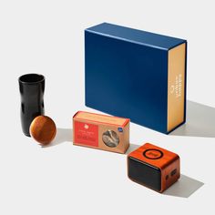 three different types of items are shown in this image, including an orange and blue box