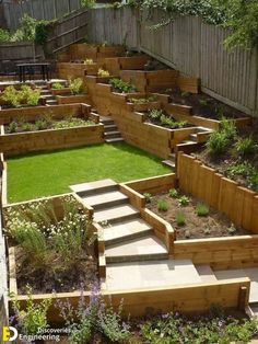 an outdoor garden with steps leading up to the grass