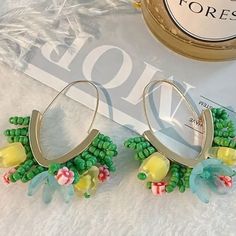 Lovely Gold Tone Oval Hoop Earrings With Green, Pink, Yellow And Blue Floral Beading. Handmade. Lightweight, Pierced. Measures Appr. 2" Long. New To Poshmark? Use Code Emmiesbling For $10 Off Your First Order! Tags: Farfetch, Net A Porter, Shopbop, Selfridges, Revolve, Instabaddie, Aesthetic, Soft Girl, Casual, Garden Party, Festival, Concert, Girly, Feminine, Spring, Summer, Casual, Vacation, Beach, Brunch, Fairy, Coastal, Femme, Romantic, Engagement Photos, Bridal Shower, Honey Moon, Cocktail Casual Garden Party, Bridal Shower Honey, Moon Cocktail, Beach Brunch, Aesthetic Soft Girl, Romantic Engagement Photos, Honey Moon, Oval Hoop Earrings, Festival Concert