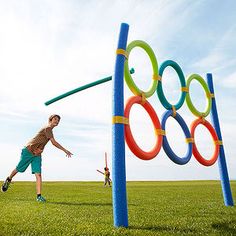 an advertisement for target station featuring a man throwing a ball in the air with rings on it