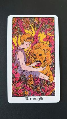 a tarot card with an image of a woman and a lion