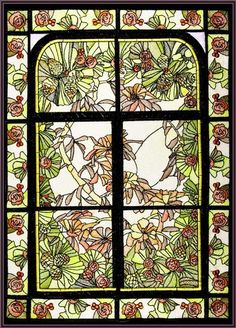 a stained glass window with flowers on it