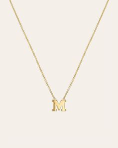 Classic and timeless 14k gold initial necklace on a dainty cable link chain in a block font. An effortlessly chic necklace with your initial or your loved one's that sits perfectly around the neckline. Wear it day or night, this necklace will be your new obsession, available in 14k yellow or white gold. Size of Initial: Approx. 5mm Total Weight: Approx. 2 grams Standard Production: 3-7 business days Rush Order Production: 2-5 business days Shipping: Select shipping method at checkout.2-Day Shipp Gold M Necklace, M Initial Necklace, Gold Letter Pendants, 14k Gold Initial Necklace, Monogram Necklace Gold, M Necklace, Gold Initial Necklace, Block Font, Horoscope Necklace