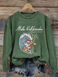 Women's Hawaiian Christmas Mele Kalikimaka Print Crew Neck Sweatshirt Casual Green Holiday Tops, Casual Green Top For Holiday, Casual Letter Print Tops For Holiday, Casual Graphic Print Holiday Sweatshirt, Casual Graphic Print Sweatshirt For Holiday, Casual Holiday Sweatshirt With Graphic Print, Island Christmas, Hawaiian Christmas, Mele Kalikimaka