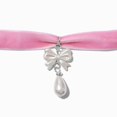 Add a pop of pink with this choker necklace. The silver-tone design has a bow pendant and a faux pearl teardrop detail. Finish: Silver-toneLength: 11.5 in. / 29.2 cm. Closure: Lobster claspMaterial: Metal - Claire's Pink Velvet Pearl Bow Pendant Choker Necklace Cute Adjustable Ribbon Jewelry, Adjustable Ribbon Jewelry For Valentine's Day, Cute White Jewelry With Ribbon, Coquette Diy, Crown Hair Clip, Disney Zombies, Sensitive Ears Earrings, Bow Choker, Flower Crown Hairstyle