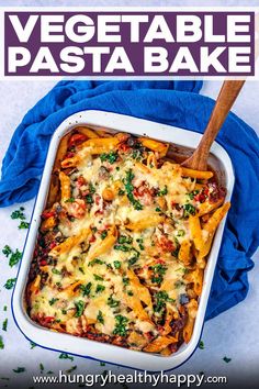 a casserole dish filled with vegetables and cheese