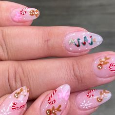 Ny Kuin Lyu on Instagram: "🌸Medium Almond GeLX with Christmas Art gingerbread man Design with snowflakes 🌸 🌸Done by Tania #christmasnails #holidaynails #reelnails #celebnails #gelxnails ##insatiablenails #nailslove #nailoftheweek #nailsrtist #nailsporn #dopenails #nailpromagazine" Gingerbread Nails Almond, Candy Cane And Gingerbread Nails, Christmas Nail Art Designs 2024, Cute Christmas Nails Gingerbread, Gingerbread Almond Nails, Almond Gingerbread Nails, Red Christmas Nails With Design, Christmas Gingerbread Nail Art, Ginger Bread Nail Art