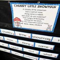 the chubby little snowman display is displayed in front of other classroom supplies and books