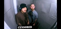 two men standing next to each other in front of a microphone with the words censored on it