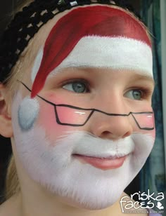 Super cute Santa face painting. Painted by Riska Faces NZ Easy Christmas Face Painting For Kids, Santa Face Painting, Face Paint Ideas Christmas, Cute Christmas Face Paint, Santa Claus Face Painting, Kids Christmas Face Paint, Kid Face Painting Ideas, Xmas Face Paint, Xmas Face Painting Kids