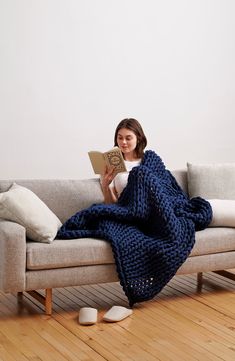 A chunky, weighted knit helps you sleep better and feel calmer under a blanket made with a touch of stretch from soft organic cotton. 40" x 72" (15 lbs.); 45" x 72" (20 lbs.); 48" x 72" (25 lbs.) 10% of your body weight recommended for optimal comfort for single-sized blankets 95% organic cotton, 5% spandex Machine wash, tumble dry Imported This product meets Nordstrom Sustainably Sourced Materials criteria: contains at least 50% sustainably sourced materials Blanket Photography, Thermal Blanket, Heavy Blanket, Chunky Knitting, Natural Weave, Organic Cotton Yarn, Knit Blanket, Improve Sleep Quality, Sleep Better