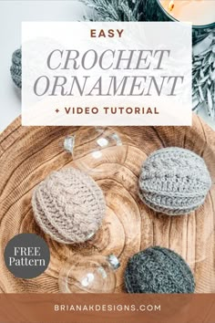 crochet ornament on a wooden plate next to candles and pine cones