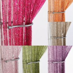 four different colored curtains hanging from metal poles