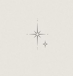 a black and white drawing of a star with two smaller stars in the middle of it