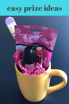 a yellow mug filled with pink items and the words easy prize ideas