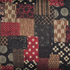 a patchwork pattern with many different colors and designs