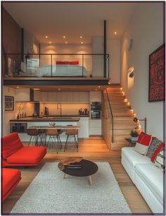 a living room filled with furniture next to a staircase