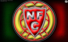 a red and yellow shield with the letter nf c in it's center