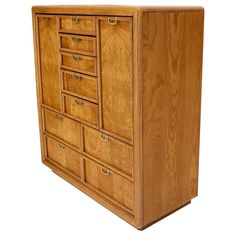 a large wooden cabinet with many drawers