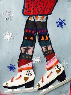 a painting of someone's feet with skis and snowflakes