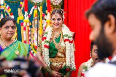 the bride and groom are getting ready for their wedding ceremony to begin in this photo