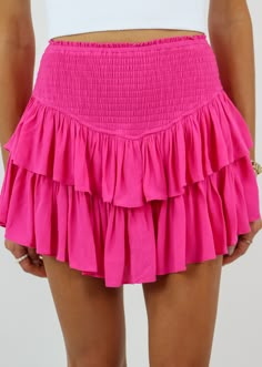 Meet the skirt right out of our day dreams. The first-ever Rock N Rags piece is back, and what better way to be than with the gorgeous Hot Pink Sunshine Daydream Skirt! This is an absolute must-have piece that fits for any occasion! “Take care of me, I’m delicate!” - Sunshine Daydream. To keep this irreplaceable skirt in the best condition, hand wash in cold water and lay flat to dry... because she’s boujee and likes to be handled with care. Or give it to your mom, she knows what to do. Model In Preppy Pink Skirts, Hot Pink Preppy Skirt, Rocks And Rags Skirt, Rock And Rags Skirt, Hot Pink Ruffle Skirt, Cute Pink Skirts, Hot Pink Skirt Outfit Ideas, Cute Preppy Tops, Preppy Concert Outfit