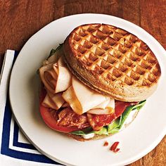 a waffle sandwich on a white plate