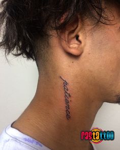 a man with a tattoo on his neck and behind the ear that reads,'love you