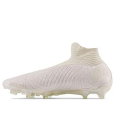 the nike vapor soccer shoe is white and has an intricate design on the upper part