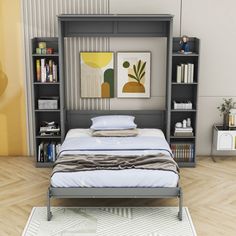 a bed sitting in the middle of a bedroom next to a book shelf