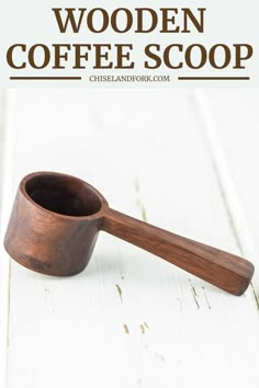 a wooden coffee scoop sitting on top of a white table with text overlay that reads how to make wood coffee scoops