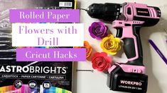 some craft supplies are laying out on a table with the words rolled paper flowers with drill cricut hacks